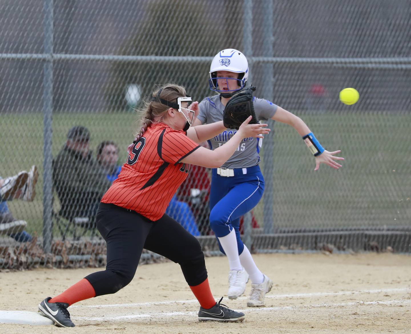 PHS senior Abby Peterson tries to beat the throw to first base at Kewanee Tuesday. The Tigresses won 4-0.