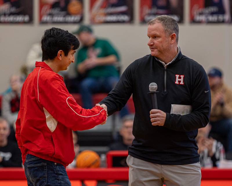 Tom Keegan and Al Baldonado shake hands at the 2026 Hall High School Hall of Fame ceremony on Saturday, January 31, 2026 at Hall High School in Spring Valley.