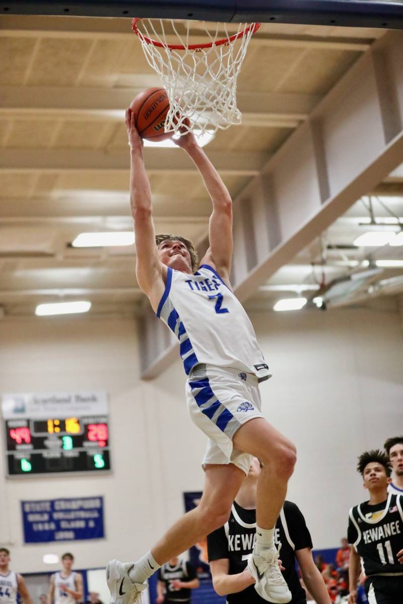 Princeton's Teegan Davis takes in a dunk against Kewanee Tuesday night at Prouty Gym. The Tigers won 66-44.