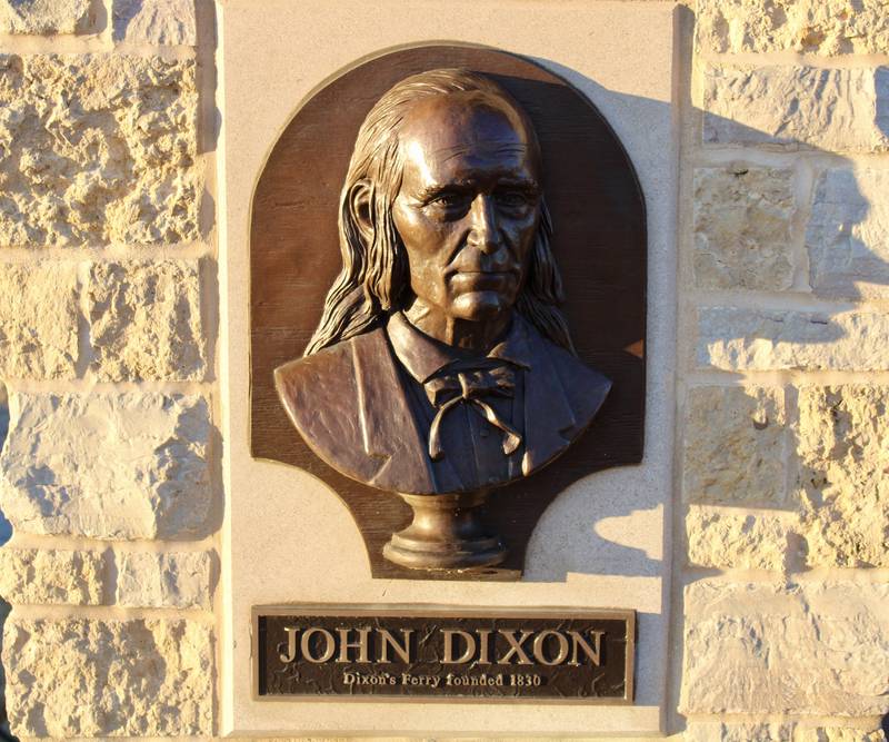 John Dixon shown in relief appears at Heritage Crossing along the Rock River in Dixon.