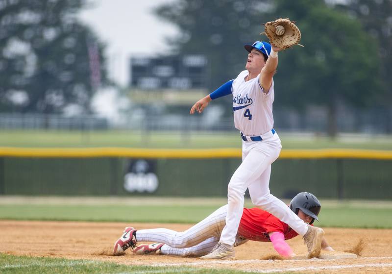 St. Francis High School first baseman Colt Armbrust catches a pickoff attempt during the Class 3A Kaneland Sectional final against Benet Academy at Kaneland High School in Maple Park on Saturday, June 7, 2025.