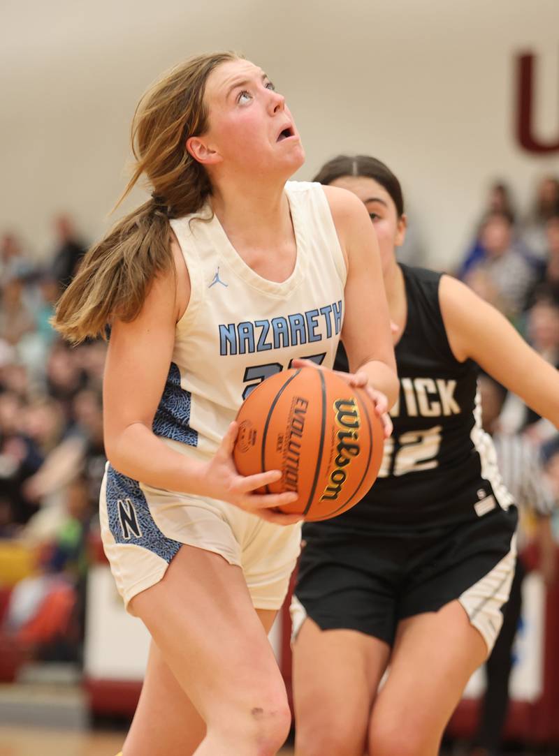 Nazareth's Amalia Dray (25) goes to the basket during the girls 3A varsity super-sectional game between Nazareth Academy and Fenwick High School in River Forest on Monday, Feb. 27, 2023.