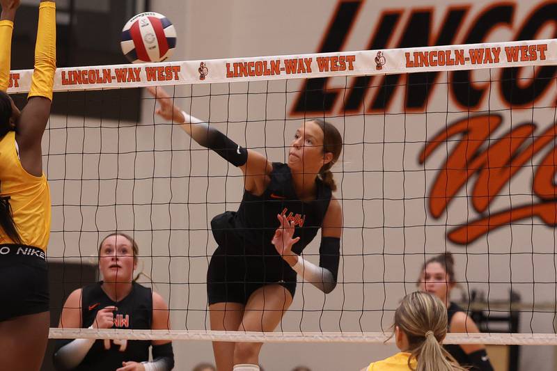 Lincoln-Way West’s Lily Goyer powers a shot against Joliet West on Monday, Sept. 30, 2024 in New Lenox.