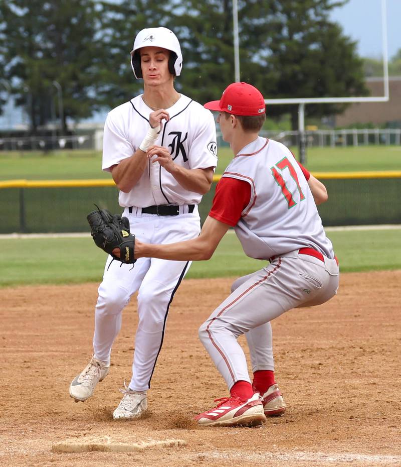 La Salle-Peru’s Gavin Stokes tags out Kaneland's Aidan Whildin at third Tuesday, May 12, 2026, during their game at Kaneland High School in Maple Park.