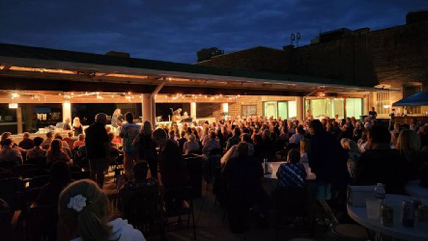 The stage is lit for a rooftop concert at the Joliet Area Historical Museum, which will renew its Summer Outdoor Rooftop Concert Series for 2025 on May 17.