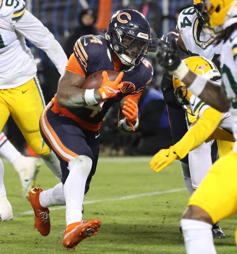 Chicago Bears running back D'Andre Swift powers through the Green Bay Packer defense for a touchdown during their NFL Wild Card game Saturday, Jan. 10, 2026, at Soldier Field in Chicago.