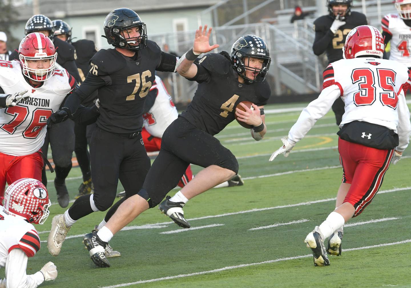 Lena-Winslow's Gage Dunker runs through a gap for a big gain at the 1A semifinal against Forreston at Freeport High School on Saturday, Nov. 19. The Panthers ended the Cardinals season willing the game 38-16 to advance to the state championship game next Friday in Champaign.