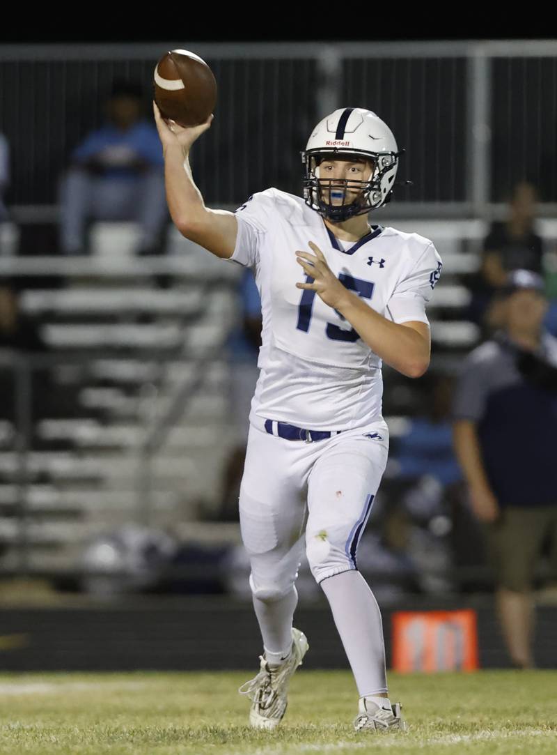 Plainfield South's Cody Hogan (15) passes during the varsity football game between Plainfield South and Oswego East on Friday, Sep. 20, 2024 in Oswego.