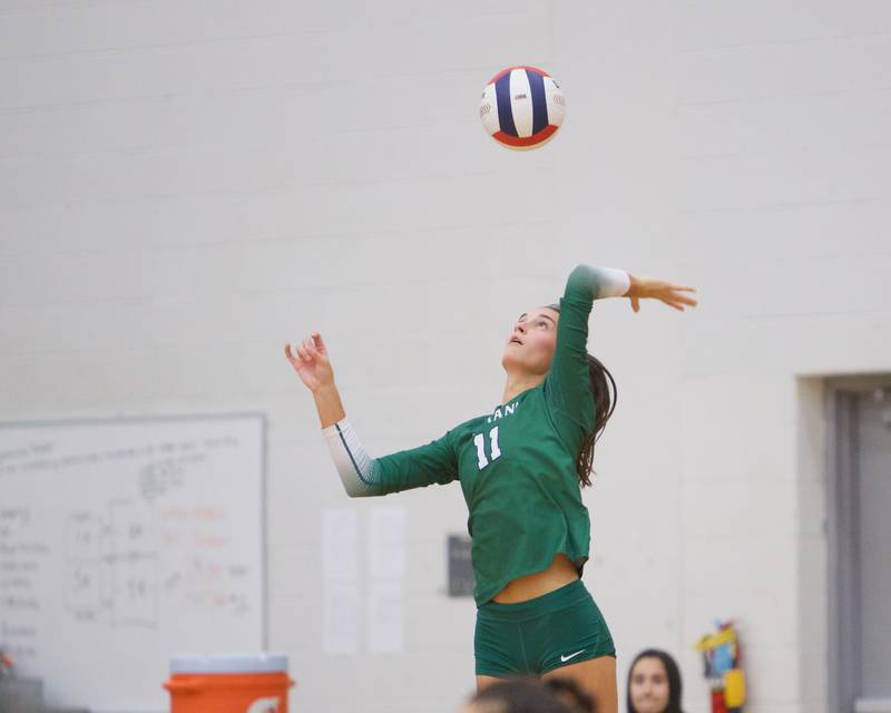 New Trier's Ana Vetter with the serve against Benet at the Class 4A Super Sectional Final on Friday, Nov.3,2023 in Bartlett.