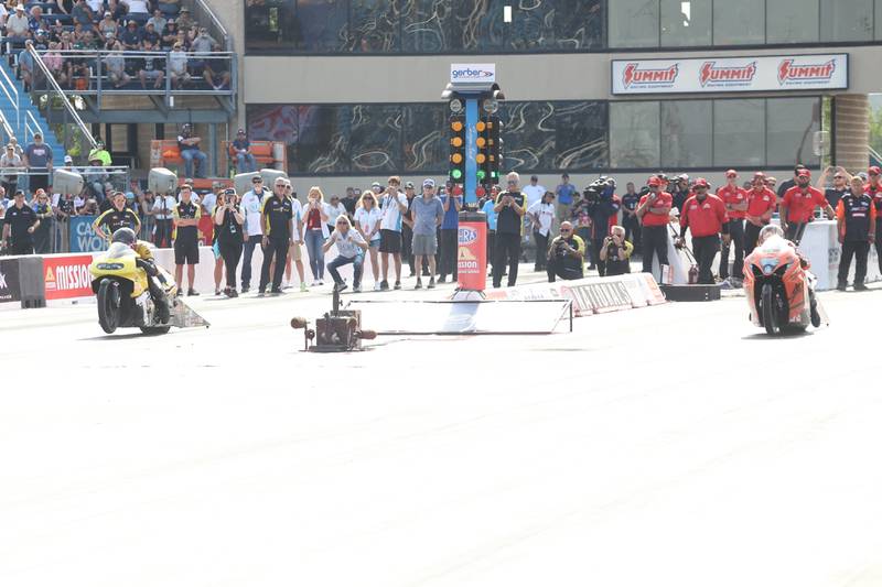 Chase Van Sant, left, and Gaige Herrera take off in the Pro Stock Motorcycle championship race at the NHRA’s Gerber Collision and Glass Route 66 Nationals at Route 66 Raceway on Sunday, May 19, 2024 in Joliet.