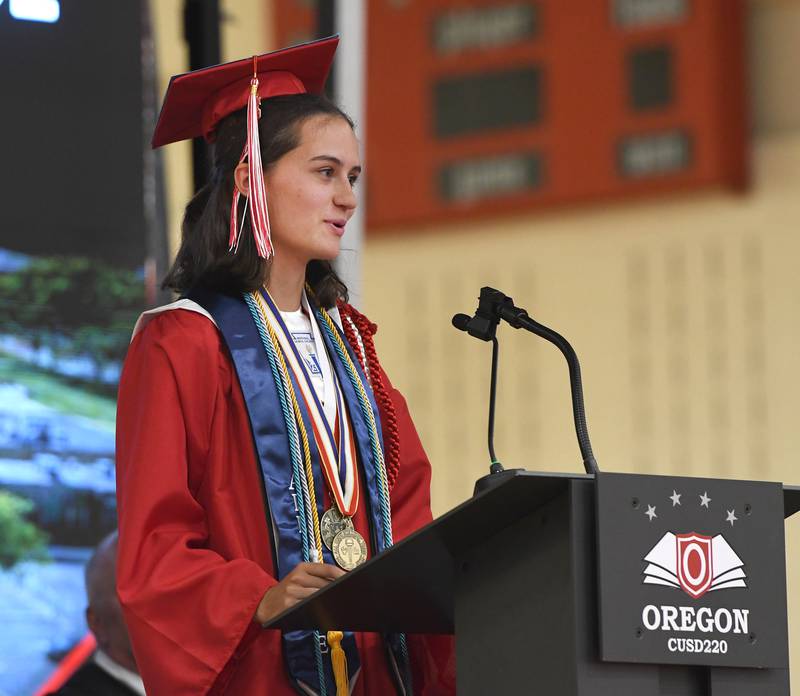 Oregon High School graduate Sarah Eckardt speaks to the crowd during her "Senior Reflection" speech at the Class of 2026 commencement ceremony on Sunday, May 24, 2026. The event was held at the Blackhawk Center in Oregon.