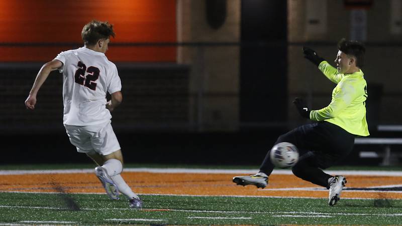 Huntley's Tyler Murray shoots the ball past McHenry's Auggie Arnold  for a goal during a Fox Valley Conference boys soccer match on Thursday, Oct. 9, 2025, at McCracken Field in McHenry.
