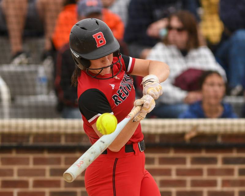 Benet Academy's Laina Rosner (7) makes contact with the ball during the regional final game against Oswego on Friday May 22, 2026, held at Oswego High School.