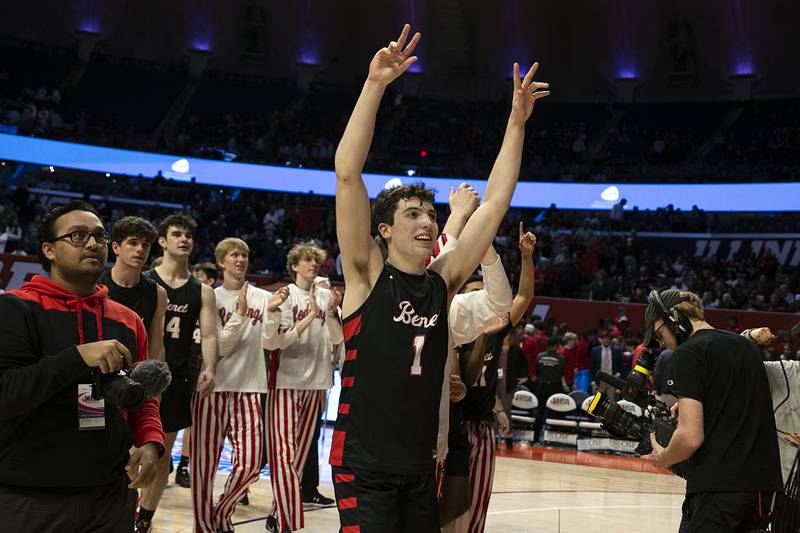 Benet Academy’s Sam Driscoll celebrates the RedWings’ win over New Trier Friday March 10, 2023 during the 4A IHSA Boys Basketball semifinals.