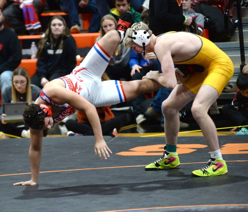 Oregon's Andrew Young tries to escape from Lena-Winslow's Eli Larson in the 175-pound title match at the 1A Byron Regional on Saturday, Feb. 8, 2025. Young lost to Larson in this match, but advanced to the Oregon Sectional.