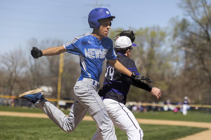 Newman’s Isaiah Williams is out on close play against Dixon Saturday, April 13, 2024 at Veterans Memorial Park in Dixon.