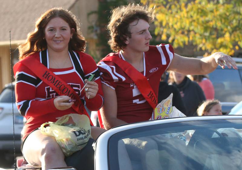Hall queen and king candidates Evey Meyer and Joseph Bacidoreride in the Hall High School Homecoming parade on Thursday, Sept. 28, 2023 in Spring Valley.