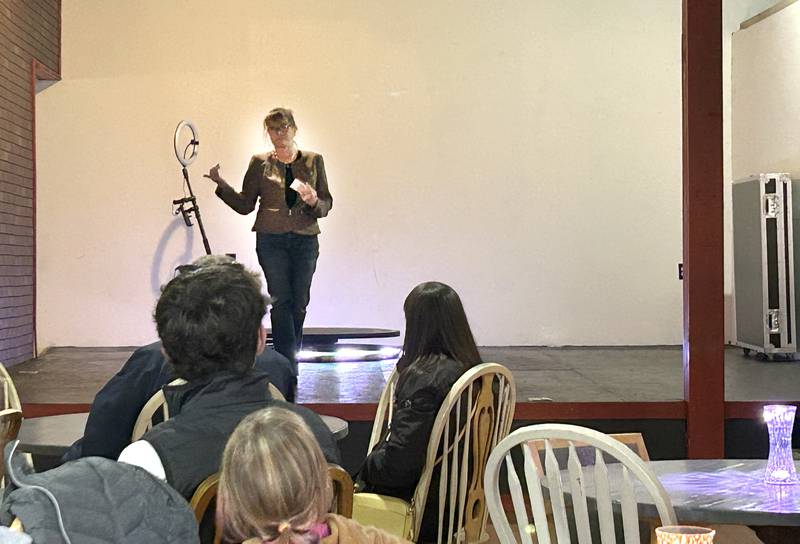 Paula Porter talks to attendees at the informational open house for the After Teen Lounge in Oregon on Sunday, Feb. 22, 2026.