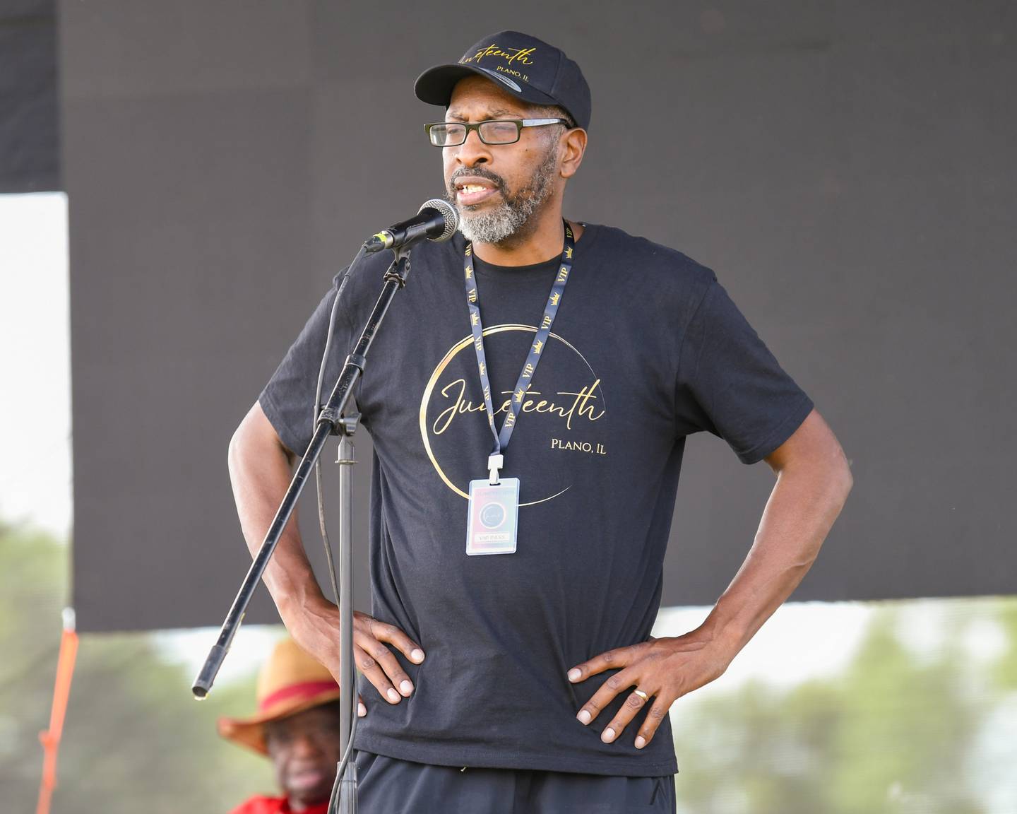 Jamal Williams introduces the essay winners during the Juneteenth event held at Emily G. Johns School in Plano on Saturday June 15, 2024.