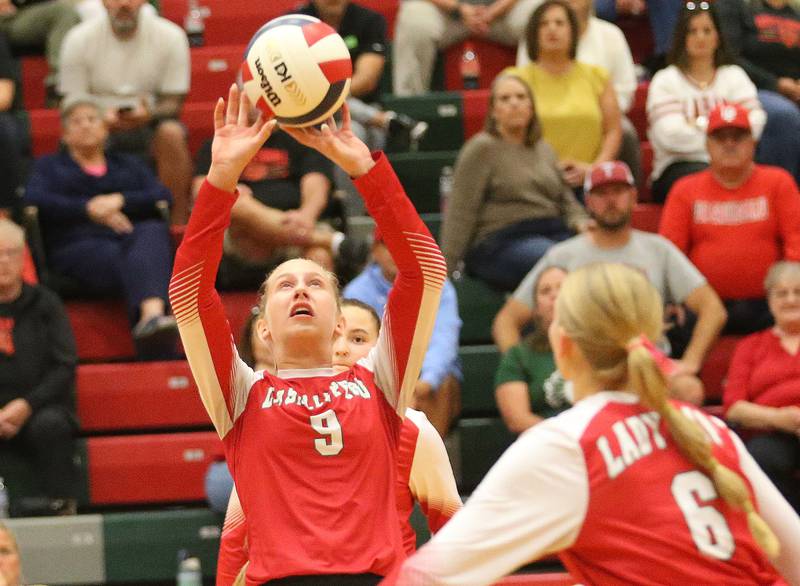 L-P's Aubrey Urbanski sets the ball in the air for teammate Maggie Boudreau on Tuesday, Oct. 7, 2025 in Sellett Gymnasium at L-P High School.