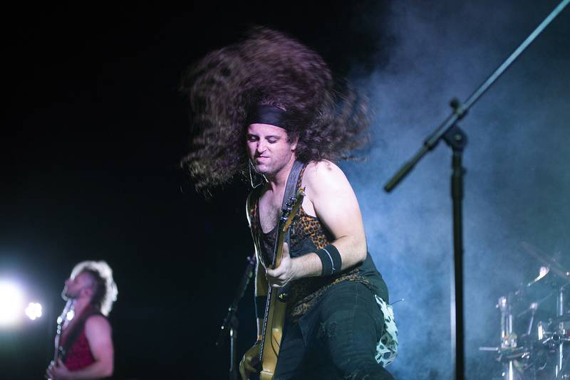 Bassist Rod Viper for the 80’s cover band “Hairbangers Ball” rocks his locks during their show Saturday, July 16, 2022 in Tampico.