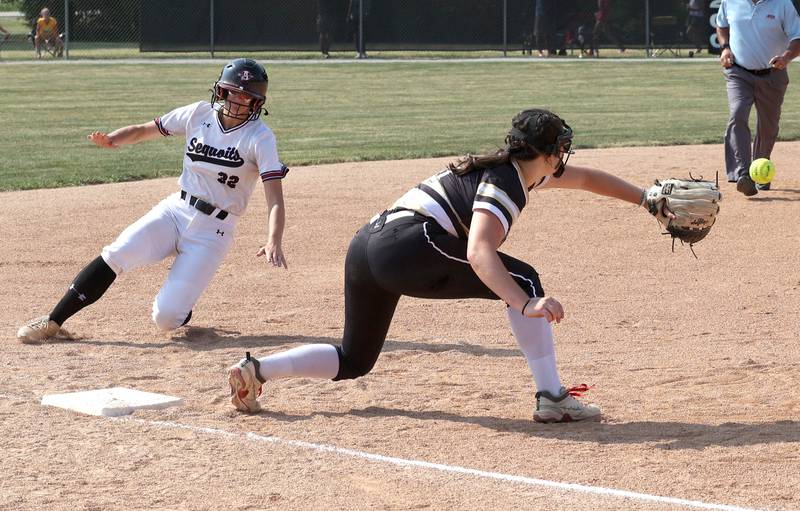 Antioch’s Emily Brecht slides around Sycamore's Brooklynn Snodgrass safely into third during their Class 3A supersectional game Monday, June 5, 2023, at Kaneland High School in Maple Park.