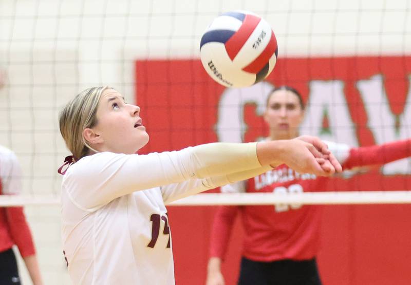 Morris libero Alyssa Jepson saves the ball during the Class 3A Sectional semifinal game on Tuesday, Nov. 4, 2025 in Sellett Gymnasium at L-P High School.
