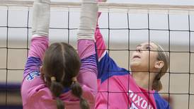 Photos: Dixon and Newman volleyball square off