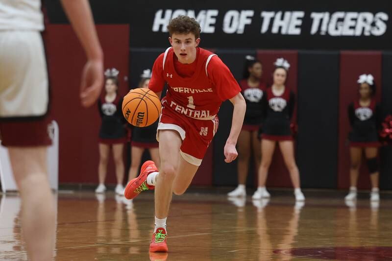 Naperville Central’s TJ Hillman takes the ball upcourt against Plainfield North on Wednesday, Jan 22, 2025 in Plainfield.
