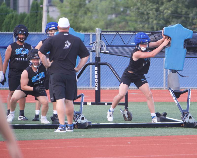 St. Charles North Varsity football run drills at the first practice on Monday, Aug.11,2025 in St. Charles.