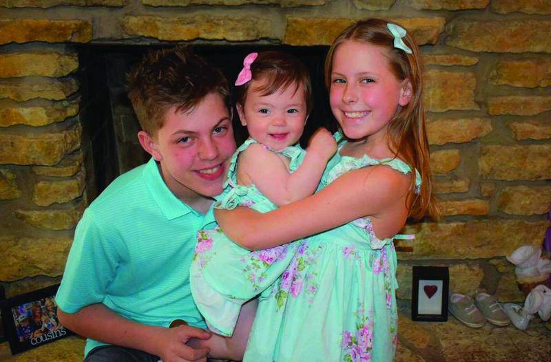 Lexi Hanson, 7, (R), continues to recover in a Park Ridge hospital from injuries sustained when she was hit by a car while riding her bicycle May 12.A Go Fund Me page was created by Lexi's aunt to help the family pay for her medical bills.