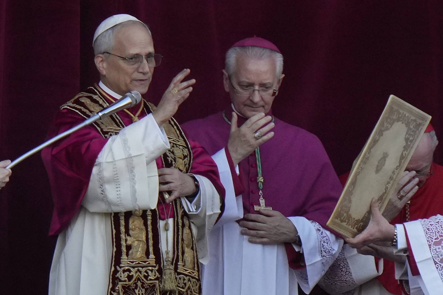 Pope Leo XIV delivers his blessing from the balcony of St Peter's Basilica after his election, at the Vatican, Thursday, May 8, 2025. (AP Photo/Luca Bruno)