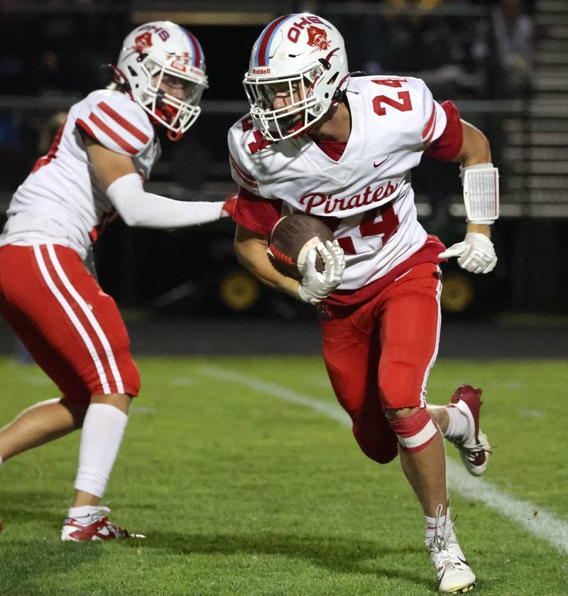 Ottawa's Weston Averkamp tries to get outside the Sycamore defense during their game Friday, Sept. 27, 2024, at Sycamore High School.