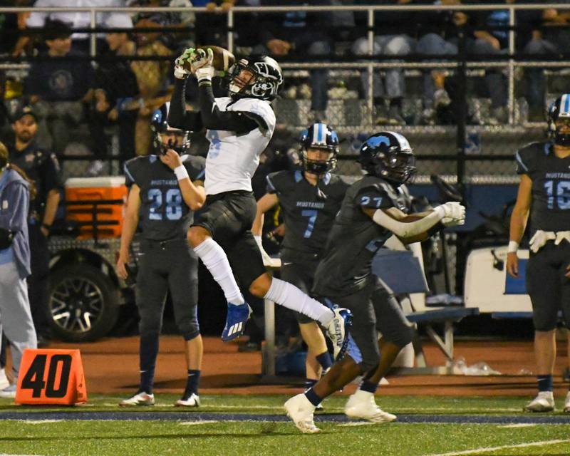 Willowbrook Martin Anfinson (8) intercepts the ball in the second quarter while taking on Downers Grove South on Friday Sep. 15, 2023, at Downers Grove South High School.