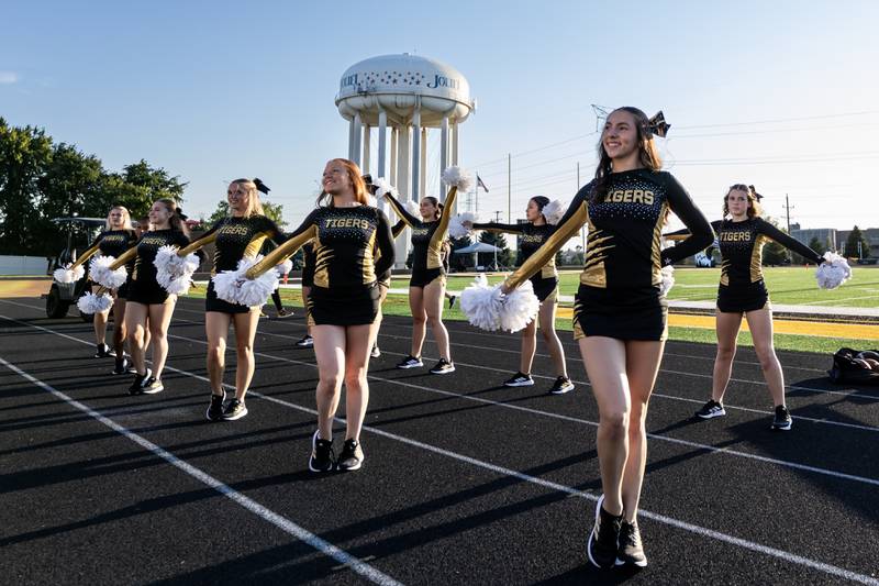 Joliet West’s varsity dance team hypes up the crowd during a varsity football home game against Plainfield South on Sept. 12, 2025.
