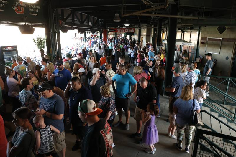 Fans pack the concourse as they arrive for the Joliet Slammers home opener against the Ottawa Titans. Friday, May 13, 2022, in Joliet.