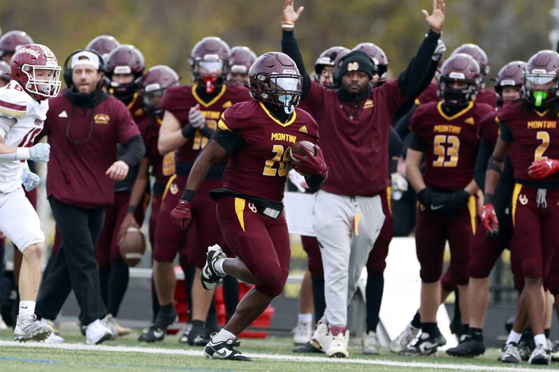 Montini's Isaac Alexander (28) heads up the sidelines for a touchdown during the IHSA Class 4A semifinals football playoff game Saturday, Nov. 22, 2025 in Lombard.