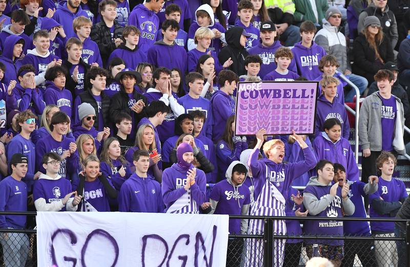 The Downers Grove North student section makes some noise during an IHSA Class 7A semifinal game against Normal Community on Nov. 18, 2023 at Downers Grove North High School in Downers Grove.
