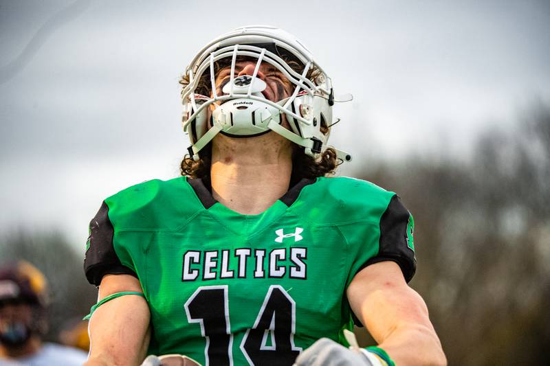 Providence Catholics Alex Gibson celebrates scoring a touchdown during the 3rd round IHSA Class 4A playoff game against Richmond-Burton Saturday Nov. 12, 2022 at Providence Catholic High School in New Lenox