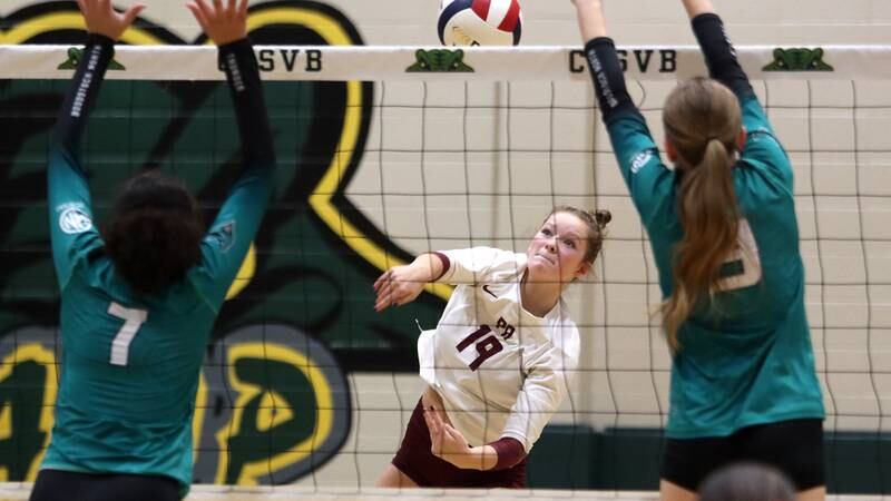 Prairie Ridge’s Tegan Vrbancic hits the ball against Woodstock North in IHSA Class 3A Sectional semifinal volleyball action on Tuesday, Nov. 5, 2024, at  Crystal Lake South High School  in Crystal Lake.