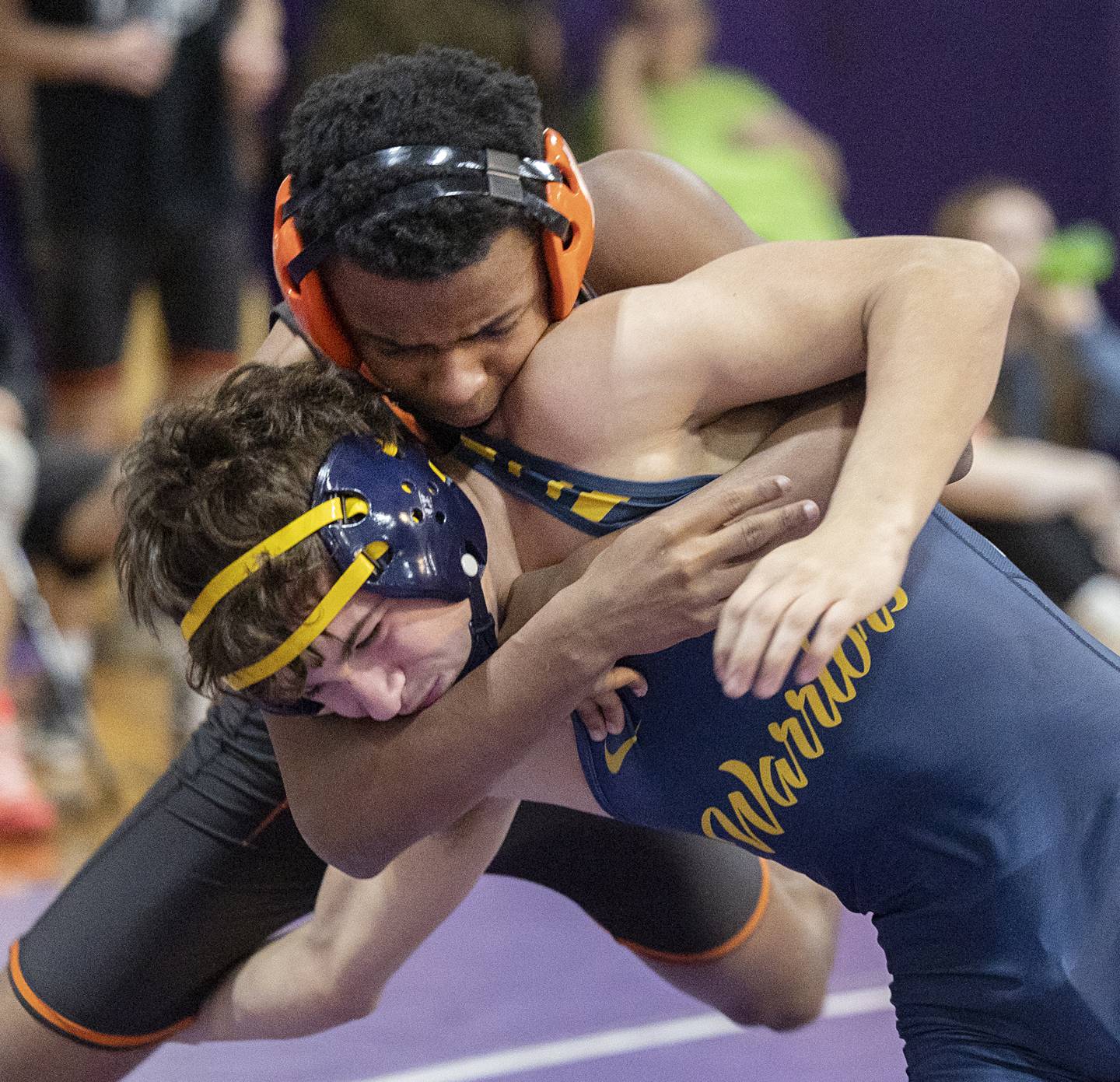 Sterling’s Landon Heckman grapples with Freeport’s Braylon Cain Tuesday, Jan. 13, 2025, in a triangular meet at Dixon High School.