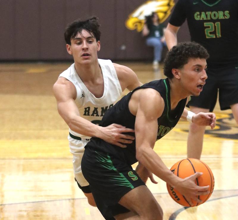 Crystal Lake South’s AJ Demirov moves the ball against Grayslake Central during Hinkle Holiday Classic varsity boys basketball tournament action on Thursday, Dec. 26, 2024 at Jacobs High School in Algonquin.