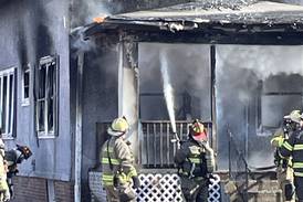 Photos: La Salle firefighters battle two-story house fire on Bucklin Street