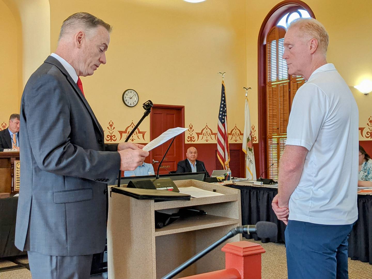 Kendall County Judge John McAdams, left, was part of a ceremony that honored Dr. Jeff Schutt.