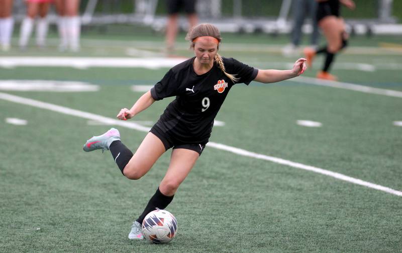Wheaton Warrenville South's Kelsey Clousing kicks the ball during a Class 3A Glenbard West Sectional semifinal game against Glenbard West on Tuesday, May 27, 2025 in Glen Ellyn.