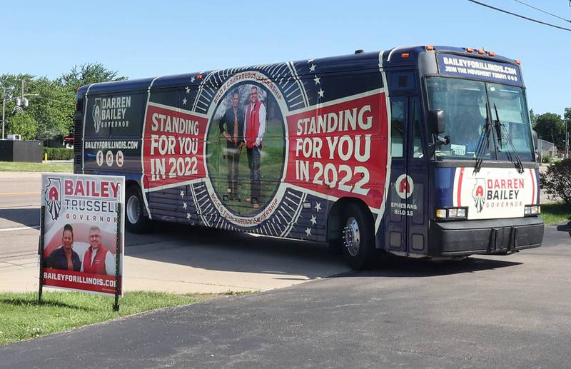 The bus carrying Darren Bailey, a Republican candidate for Illinois governor, pulls into Tom and Jerry's in Sycamore Friday, June 17, 2022, for a stop on his campaign bus tour.