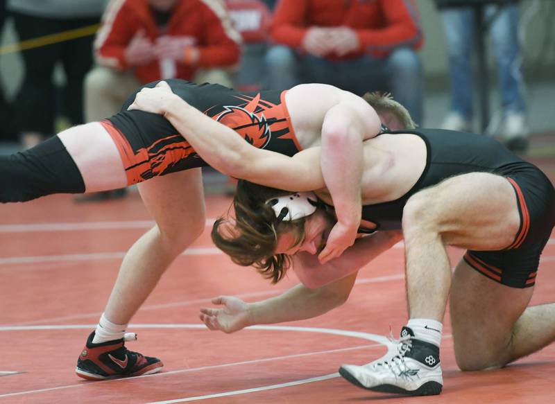 Erie's Jase Gunder moves underneath Stillman Valley's Jack Seacrist during their 152-pound match at the 1A Oregon Wrestling Sectional on Friday night.