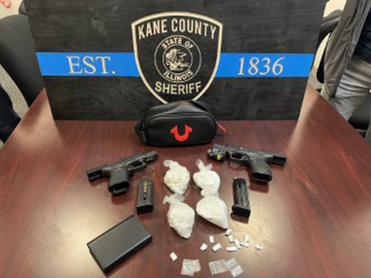 The Kane County Criminal Interdiction Team recovered two guns and drugs Jan. 15 in a traffic stop in Rutland Township, resulting in the arrest of Aaron M. Mitchell, 28, of Wisconsin.