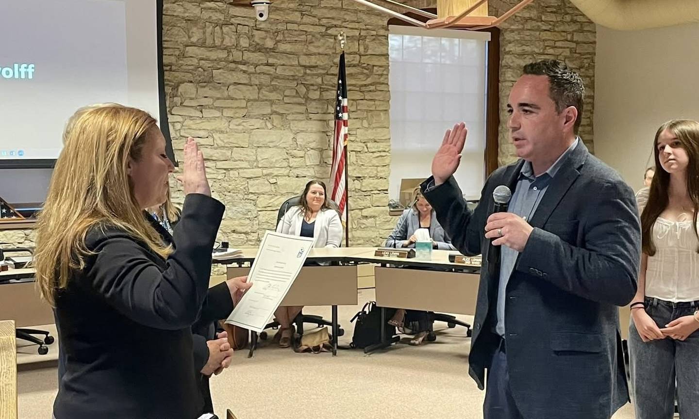 New Ward 5 Alderman Jim Fahrenbach is sworn in by Kane County State's Attorney Jamie Mosser at the May 5, 2025, Batavia City Council meeting, marking the start of his four-year term replacing Mark Uher, who did not run for reelection.