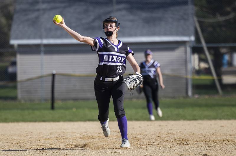 Dixon’s Kennedy Haenitsch throws to first for an out against Rock Falls Tuesday, April 9, 2024 at Reynold’s field in Dixon.